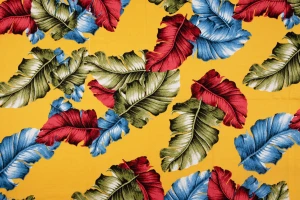 Wiskoza kolorowe liście bananowce na miodowym tle