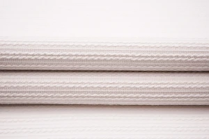 Dzianina swetrowa warkocz śmietankowa